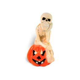 Szkielet siedzący na dyni lampion , halloween